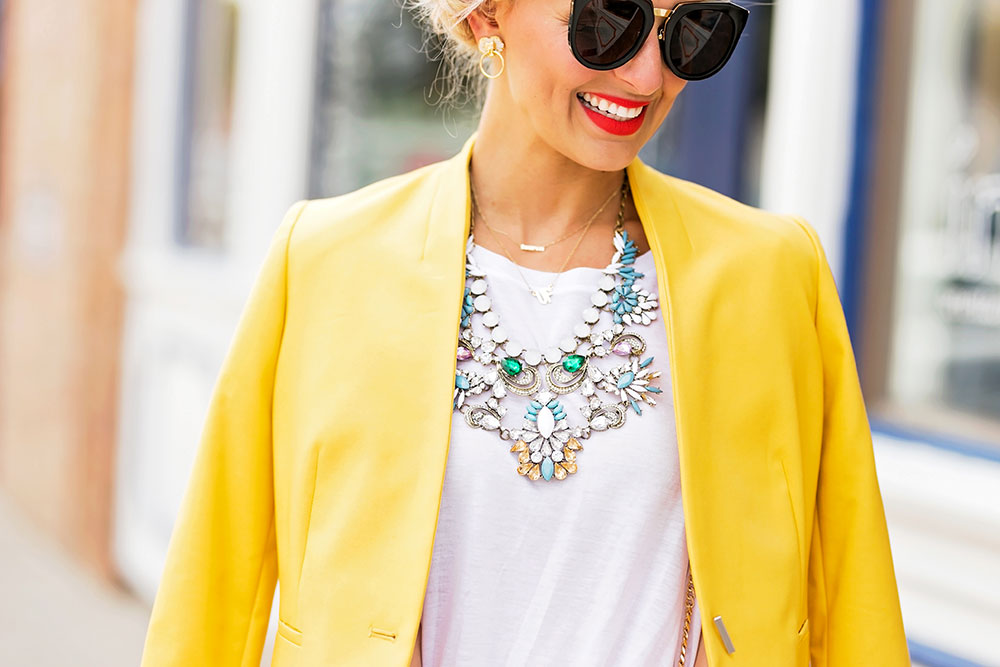 statement necklace t-shirt jeans outfit