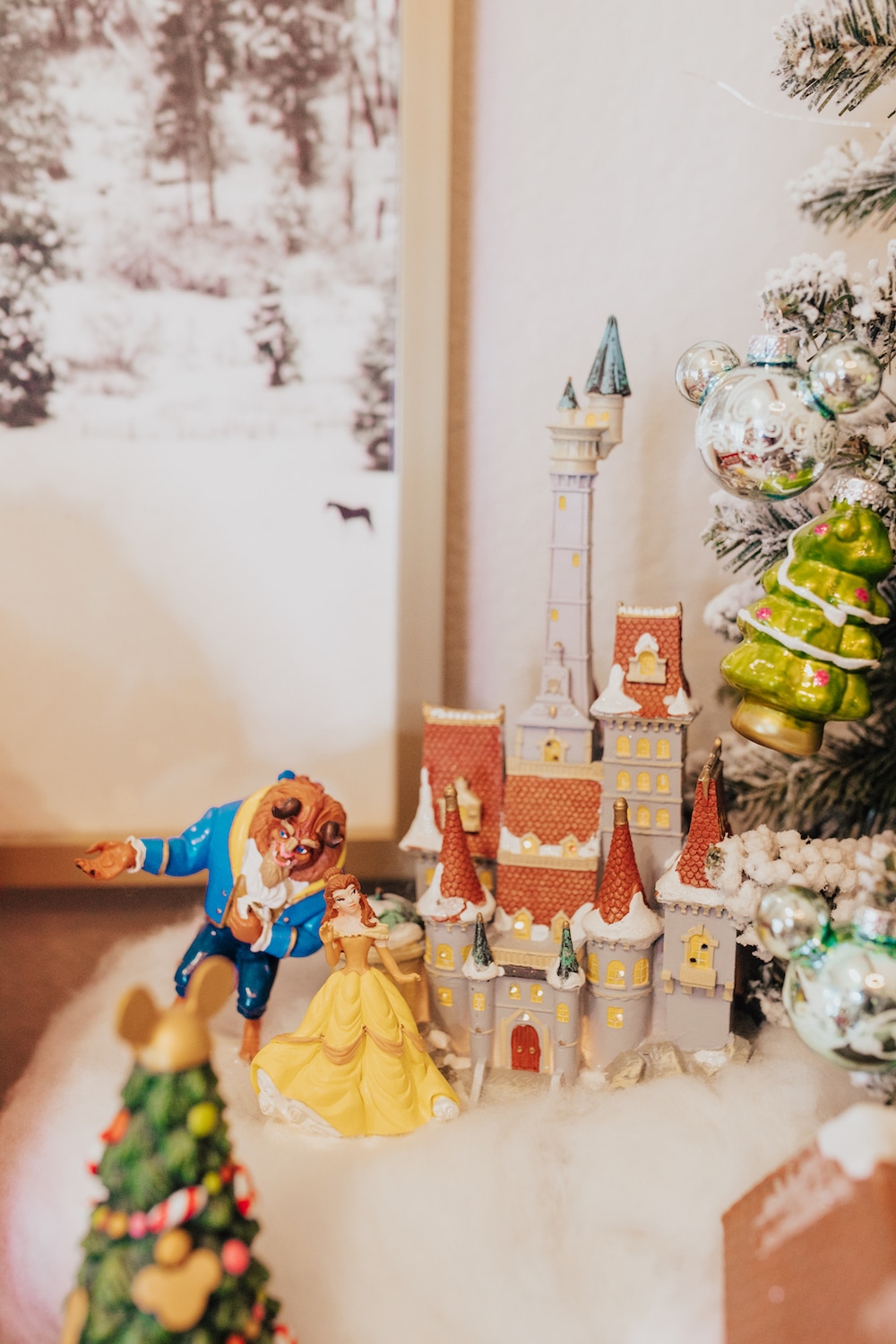 how to create a disney mickey's christmas village display on a table - colorful christmas decor - department 56 - beauty and the beast