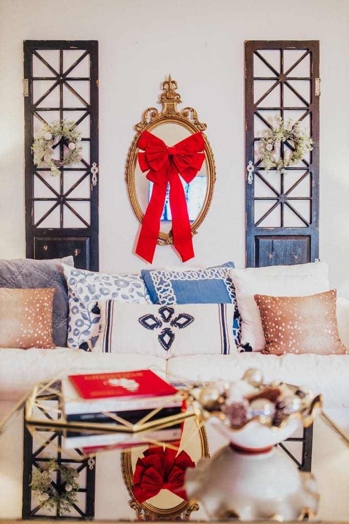 how to decorate a small living room for christmas - large red velvet christmas ribbon wall decor