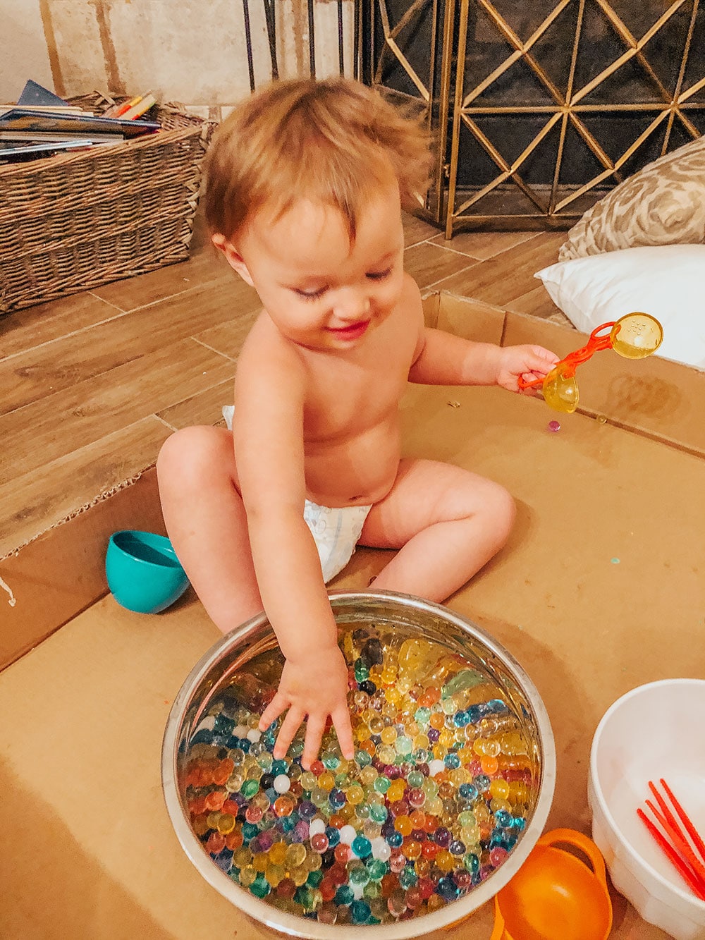 toddler activities to do at home - indoor activity - water table - water beads sensory toy