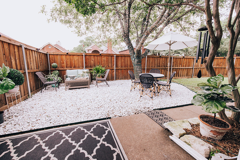 small back porch ideas - affordable outdoor furniture- white gravel patio area